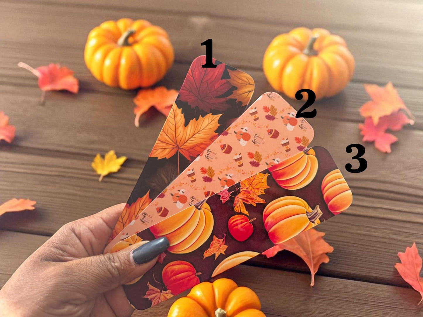 Pumpkin spice bookmarks with leaf and coffee designs, ideal for fall decor, by Forcebuilder. Single or set of stylish paper bookmarks.