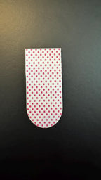 Holographic polka dot magnetic bookmarks with shiny rainbow polka dot design, perfect for marking pages in books.