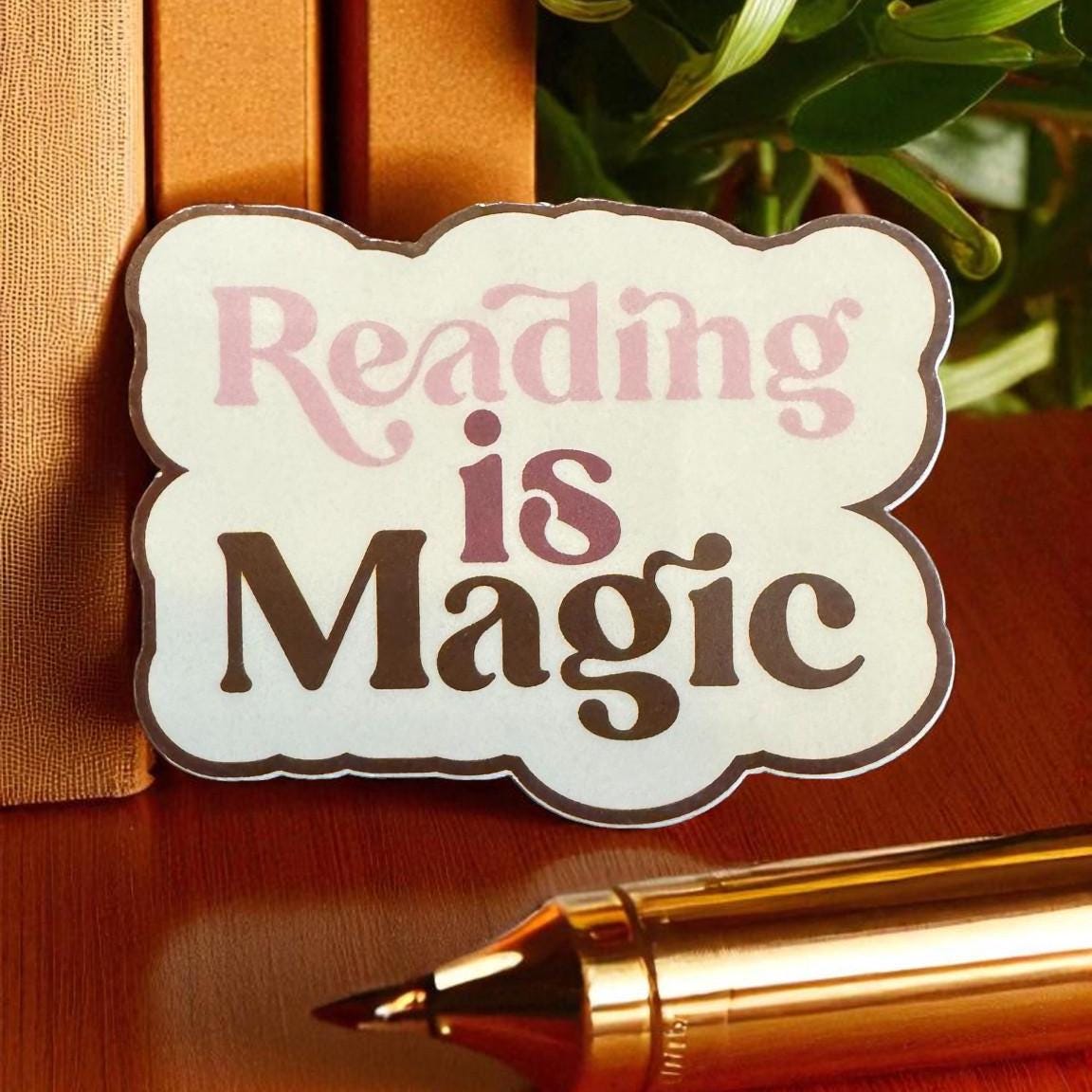 Forcebuilder reading is magic vinyl sticker featuring a cozy bookish design, ideal for journals, laptops, and book lovers.