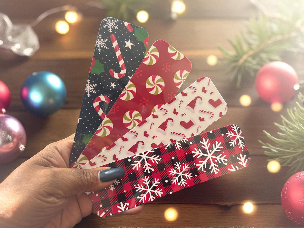Set of four festive holiday candy bookmarks by Forcebuilder, featuring colorful, themed designs for holiday reading accessories.