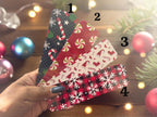 Set of four holiday-themed candy bookmarks from Forcebuilder, festive reading accessories with colorful, decorative designs.