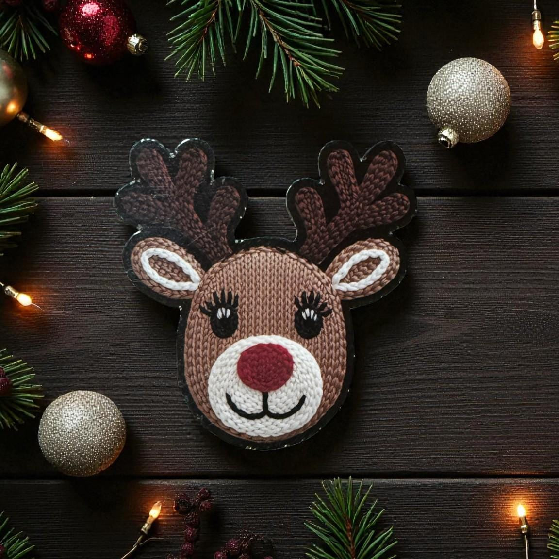 Crocheted reindeer sticker by Forcebuilder featuring a cozy Christmas deer design, perfect for holiday decor and winter crafts.