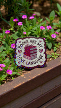 Books Are My Love Language sticker by Forcebuilder featuring a cozy, bookish vinyl decal for literary lovers and readers.